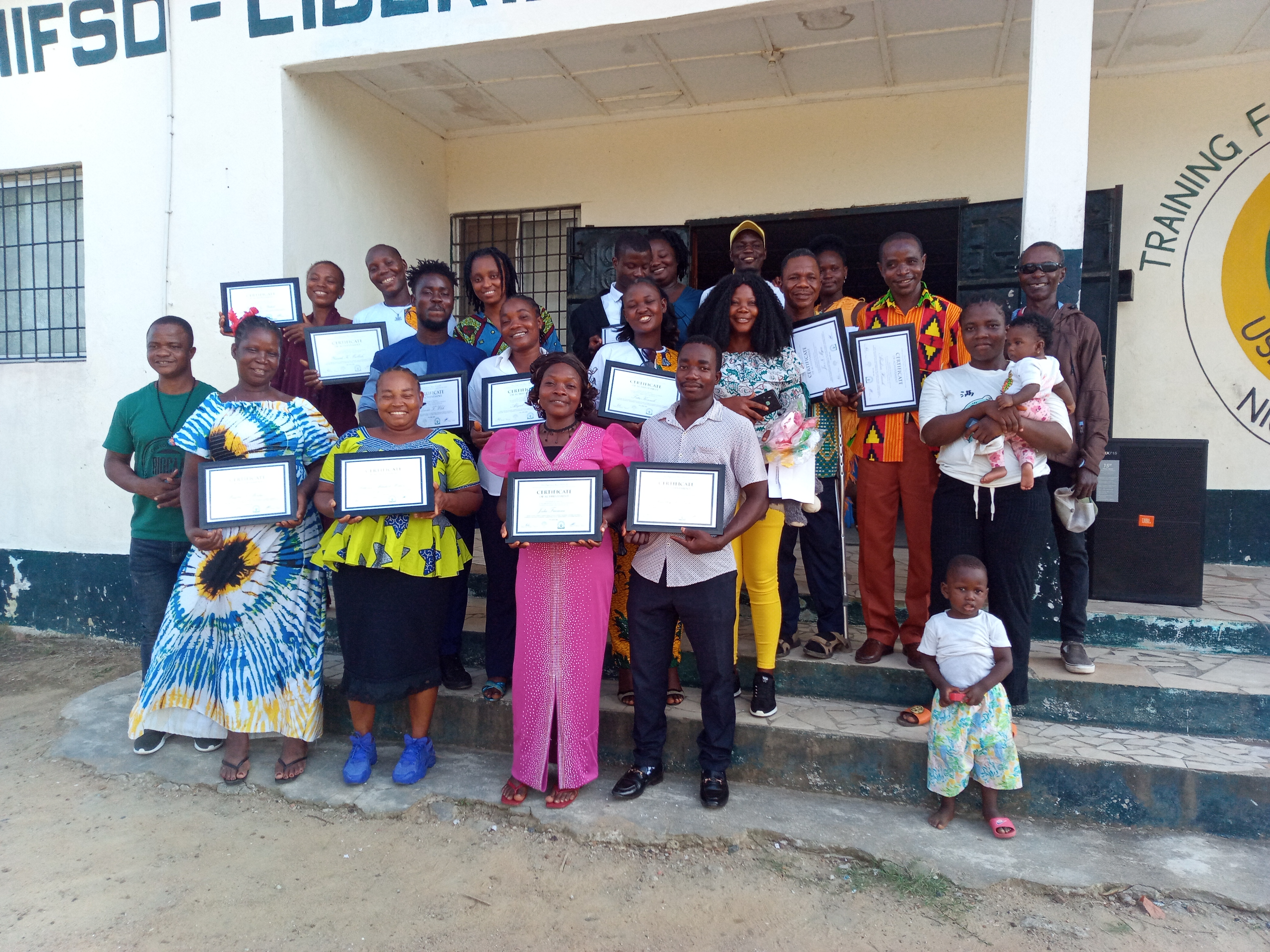 SHIFSD business training graduates holding certificates at the Multipurpose Youth Training Center
